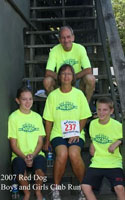 Photo of Bev Gardner with the Edmondsons after the race.
