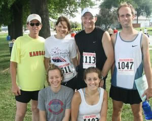Photo of a bunch of medal winners from Lawrence at the Lenexa Freedom Run.