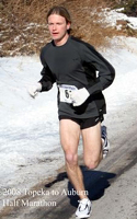 Photo of runner in shorts in minus six degrees weather.