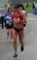 Photo of female winner in the Kansas Half Marathon.