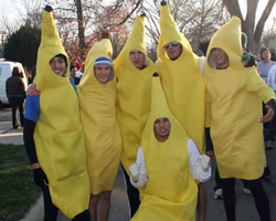 Photo of guys in banana suits.