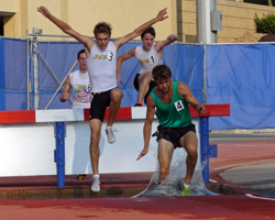 Photo of the boys 2000m steeplechase at the AAU Region 11 Meet at KU.