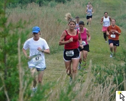 Photo of Leah Kuhlman at the Course of Dreams cross country 5K at Shawnee Mission Park and link to the FLickr slideshow.