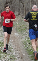 Passing each other at the Pi Day Rotation Run on the river trails.