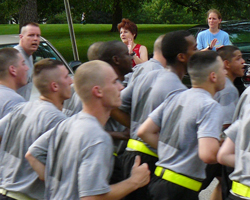 Photo of Sandy Weston and Stephanie Amman viewing the formation runners from Ft. Riley.