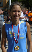 Photo of Karen Hyde with medal.