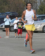 Photo of Denny Gayton winning the Pilgrim Pacer Marathon.