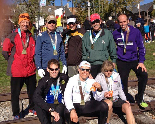 Photo of Lawrence runners at the MO' Cowbell Half Marathon.