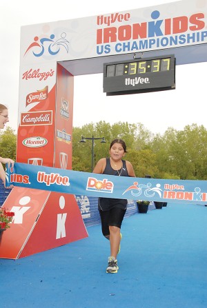 Photo of Hepanna Gayton finishing the HyVee Iornkids Competition.