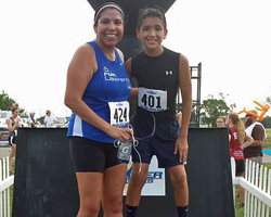 Photo of Rhonda LEValdo and Carson Jumping Eagle at the Sunflower Games 10K.