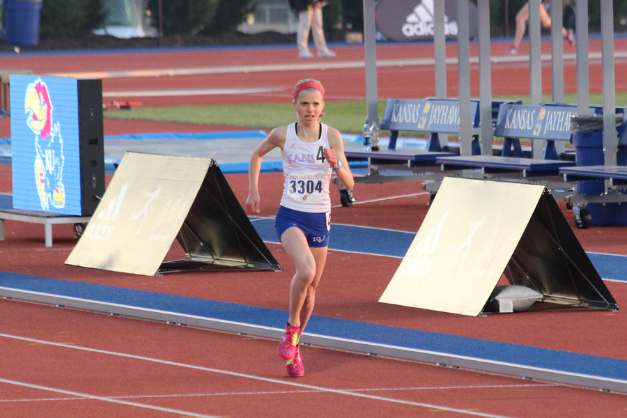 Photo of Grace Morgan winning the 5000 meters on Thursday, April 17, 2014.