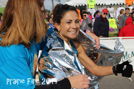Photo of Raquel STucky after setting the new women's marathon record in Kansas.