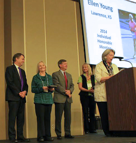 Photo of ELlen Young receiving award.