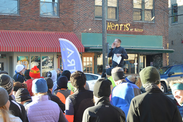 Photo of J. Jenkins giving instruction sbefore the New Year's Day Run in Lawrence.