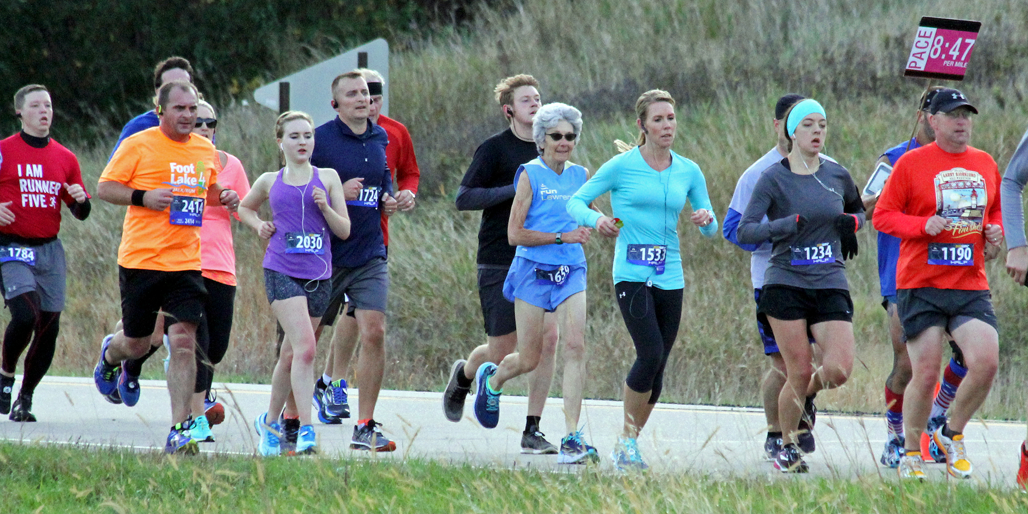 Dee Boeck with the 1:55 pace group in the Mankato Half Marathon.