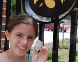 Photo of Amy Meyers with her camp Hustle Award.